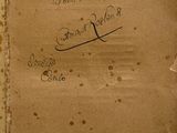 a piece of paper with writing on it sitting on a table