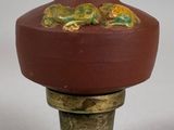 two vases that are sitting on top of each other