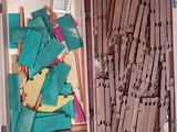 a box full of clothes pins and clothes pegs in it