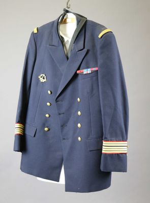 an image of a blue jacket with gold buttons and a tie on a hanger