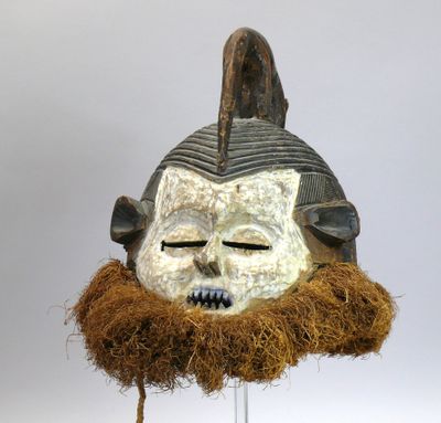 Masque heaume "Hemba" en bois léger à patine sombre d’usage …