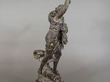 statue of a man on a horse with a bird in his hand