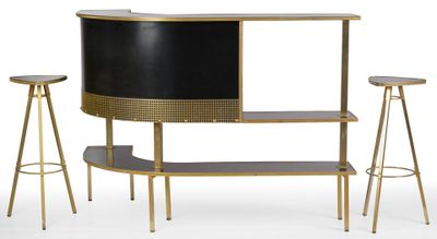 a black and gold bar with three stools next to it
