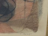 a drawing of a woman ' s face on a piece of paper