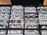 a lot of glasses that are sitting in a box