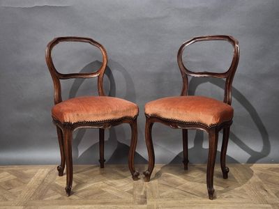 pair of 19th century french louis xvi style walnut side chairs