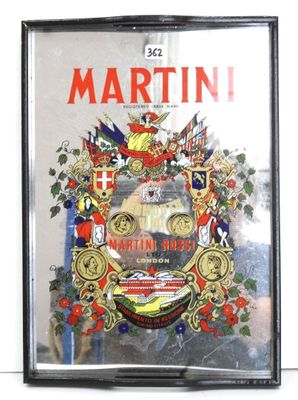 affiche encadrée représentant un homme tenant une bouteille de martini