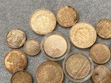 a lot of coins that are on the floor