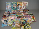 a lot of comic books that are on the table