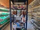 a shelf with a lot of items in it in a store