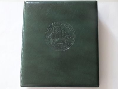 an image of a green book with a picture of a ship on it