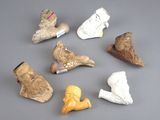 many small figurines of different shapes and sizes