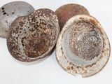 three bowls that are sitting on a white surface