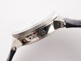 wrist shot of a watch on a white surface with a white background