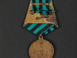 a close up of a medal on a black surface