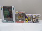 three pop vinyl figures are sitting on a table next to a box of pop vinyl