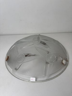 a glass plate with a horse on it sitting on a counter
