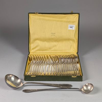 a box of silverware with a spoon and spoons in it