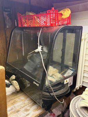 an image of a machine that has some food in it
