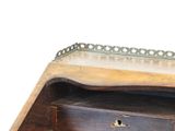 a wooden desk with a drawer on top of it