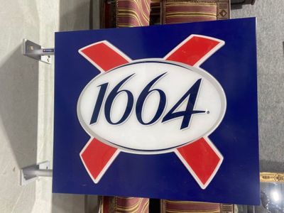 a blue sign with a white and red x on it