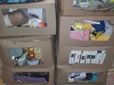 many boxes stacked on top of each other in a warehouse