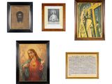 many framed pictures of jesus and other religious items on the wall