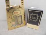 deux flacons de parfum « Royal » dans un sac cadeau