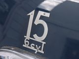 a close up of the number 15 on the front of a car