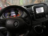 steering wheel of a car with a digital display on the dashboard