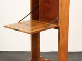 an image of a small wooden desk with a drawer on top of it