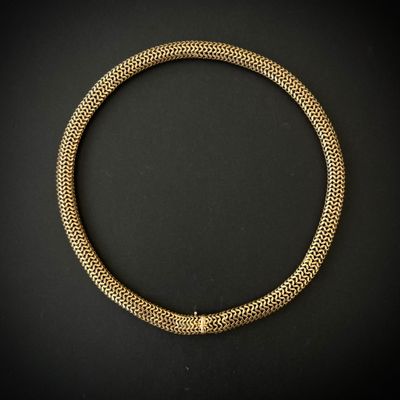 Collier en or rose 750°°° (têtes d’aigle et rhinocéros) à ma…