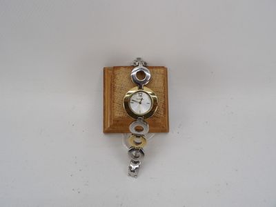 Pierre LANIER - Montre bracelet en métal doré et argenté.