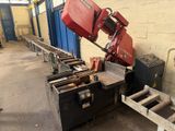 a picture of a machine that is working on a piece of wood