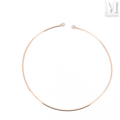 a close up of a necklace on a white background