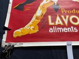 a large red sign with a picture of a man kicking a soccer ball
