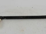 a black handle with a tag attached to it