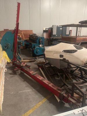an image of a boat being loaded onto a trailer