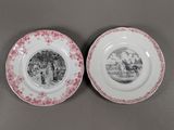 two plates with a picture of a man and a woman on them