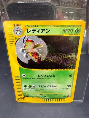 a pokemon card with a picture of a bird on it