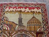 an image of a rug with a picture of a mosque on it