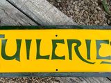 a yellow and green sign that says tuller ' s on it