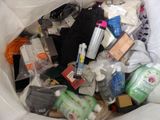 a white bag full of various items that are in it