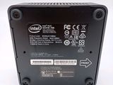 the back of a black computer case with a label on it