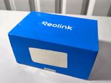 an image of a blue box sitting on top of a white table