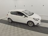 a picture of a white car parked in a garage