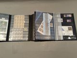 a lot of different stamps on the pages of a binder
