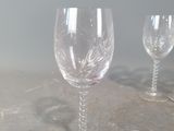 two empty wine glasses sitting on a table