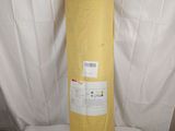 the yellow fabric is wrapped around the large yellow object