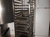 an image of a metal rack with a bunch of trays
